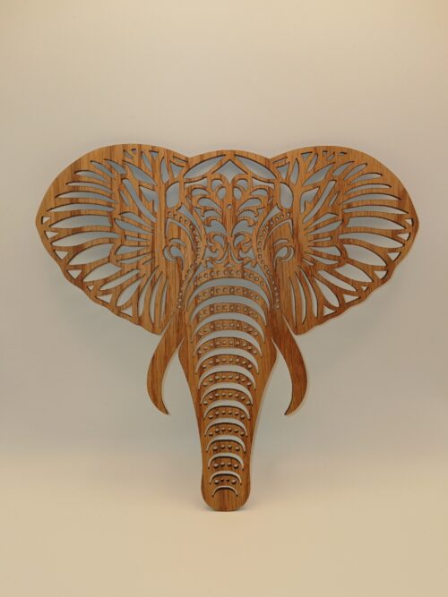 Laser cut ornate oak elephant head wall decoration with detailed design